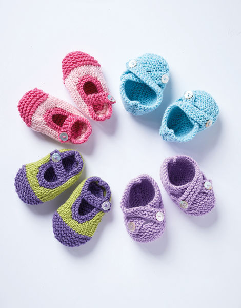 Sirdar 5249 Adorable Shoes knit out of DK/# Weight yarn.